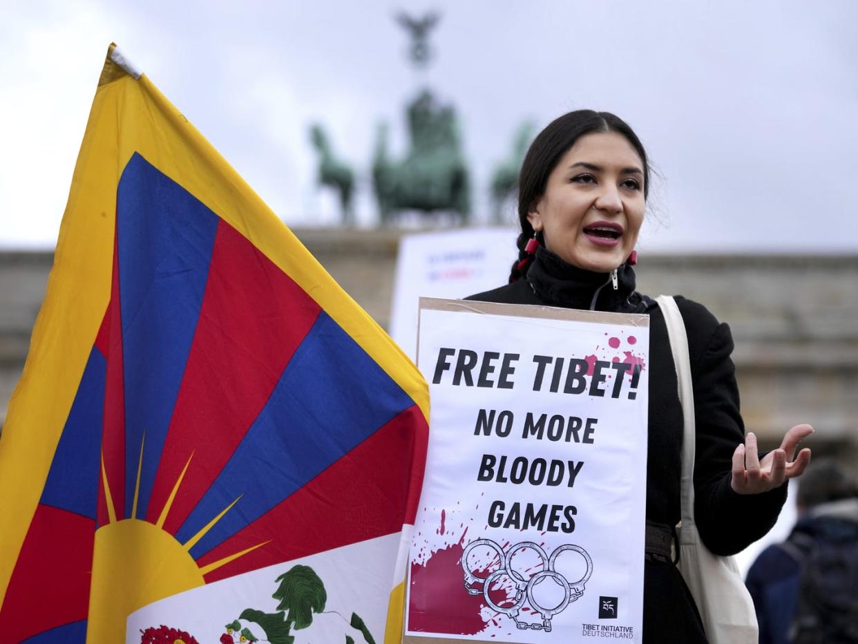 <span class="caption">A protest against the 2022 Beijing Olympics is held in Berlin, Germany on Jan. 4, 2022. </span> <span class="attribution"><span class="source">(AP Photo/Michael Sohn) </span></span>