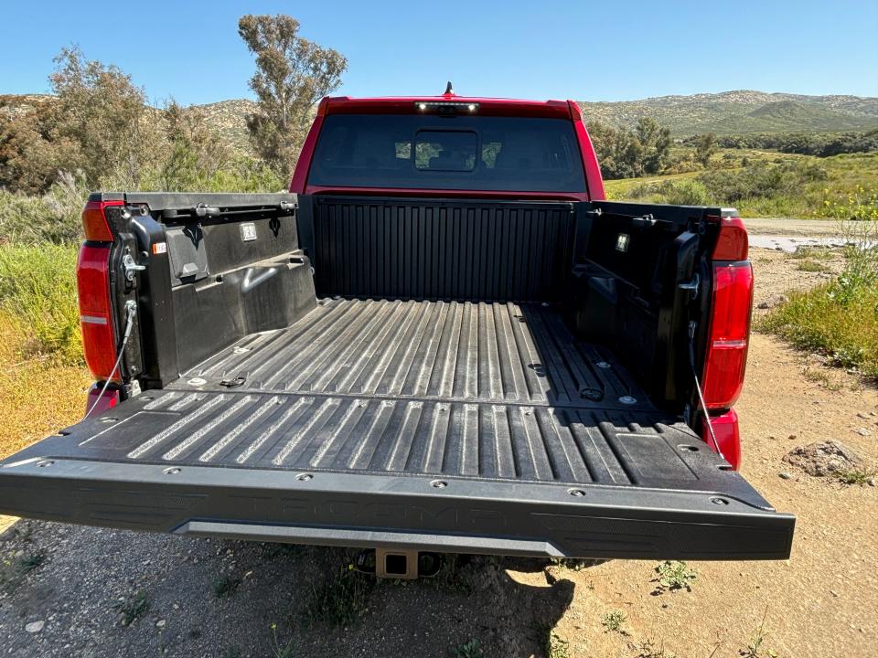 The 2024 Toyota Tacoma midsize pickup offers a hybrid drivetrain that increases power and fuel efficiency.