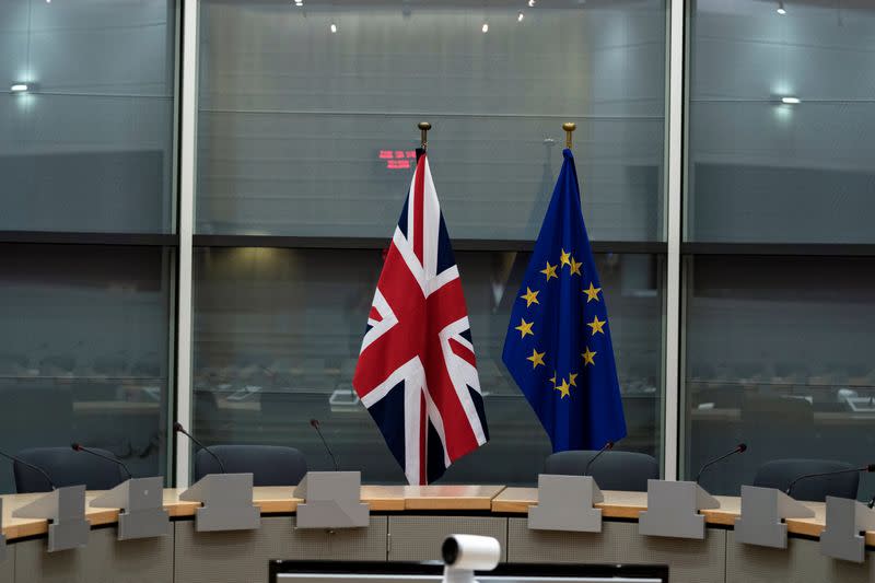 British Union Jack and EU flags are pictured before the meeting with Britain's Brexit Secretary Barclay and EU's chief Brexit negotiator Barnier in Brussels