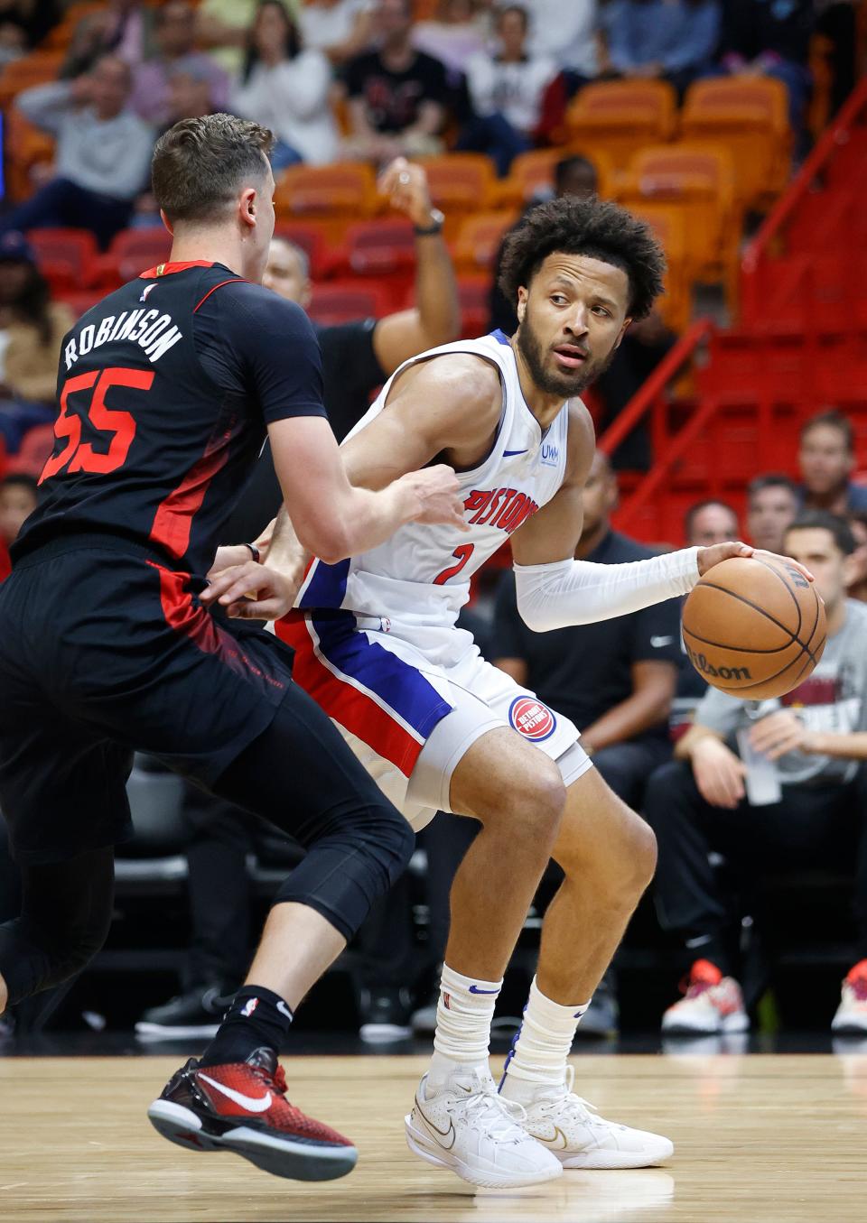 Miami Heat forward Duncan Robinson defends Detroit Pistons guard Cade Cunningham during the first half at Kaseya Center in Miami on Tuesday, March 5, 2024.