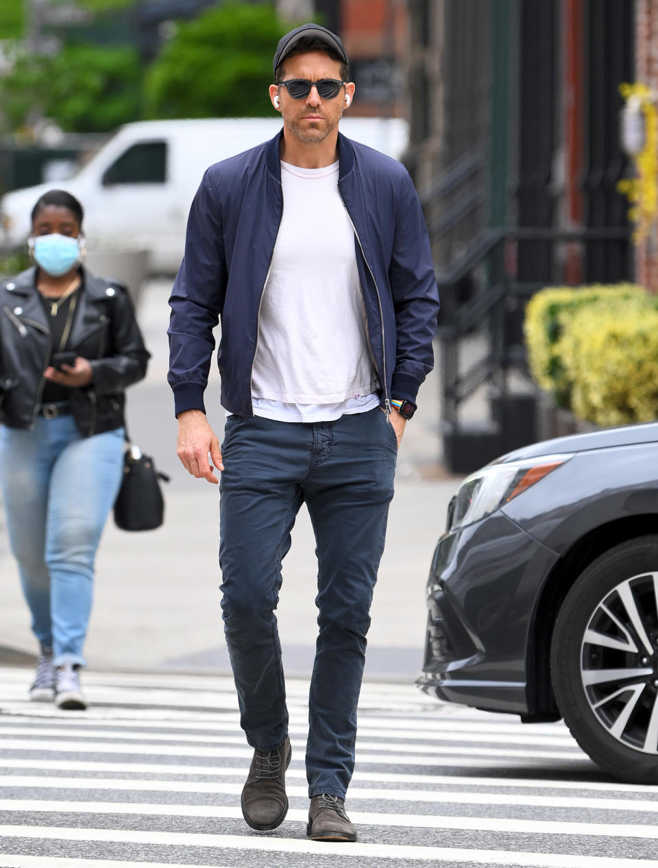 <p>Ryan Reynolds takes a solo walk on May 13 in N.Y.C.'s Tribeca neighborhood.</p>