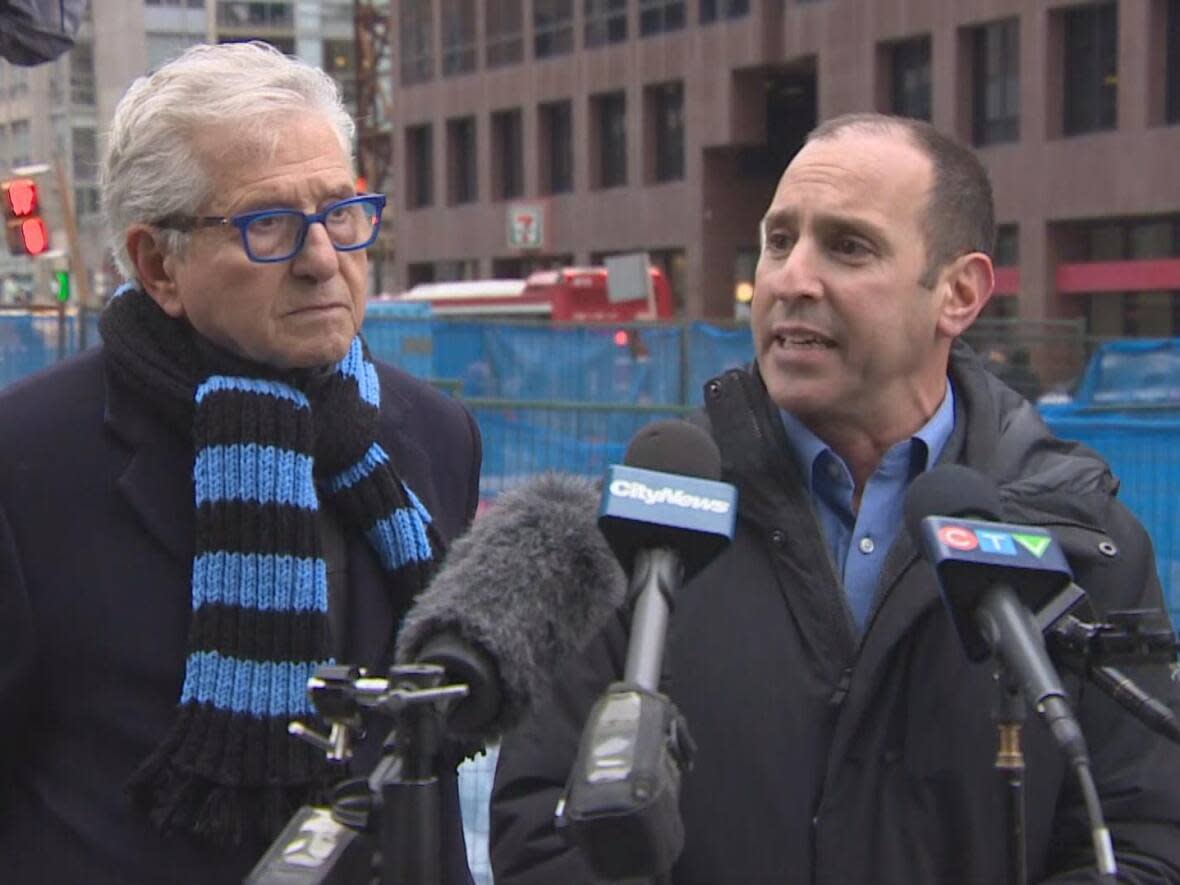 Councillors Joh Matlow, right, and Mike Colle, who represent Toronto-St. Paul's and Eglinton-Lawrence respectively, first indicated they planned to call for a public inquiry into the stalled project late last month.  (Claude Beaudoin/CBC - image credit)