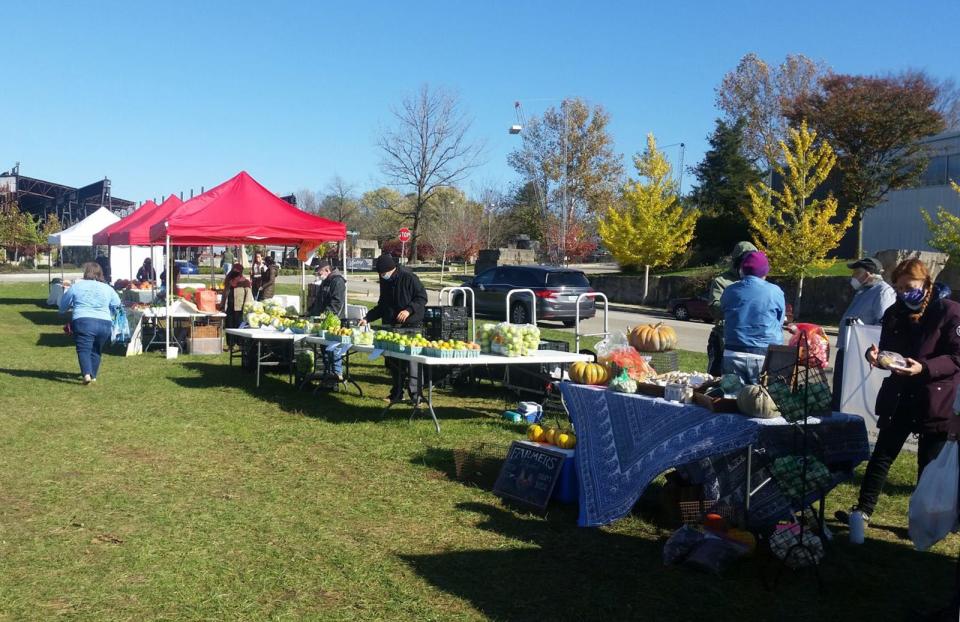 2020’s final Bloomington Woolery Farmers’ Market is seen in the grassy field just south of the Woolery Mill along West Tapp Road. The market opens for its 2022 season on Saturday.