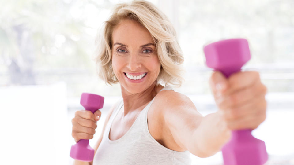 woman lifting weights