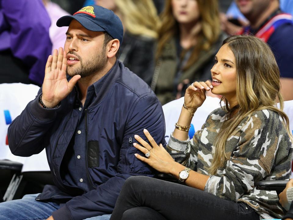Scooter Braun, left, and wife Yael Cohen attend the game between the Los Angeles Clippers vs. the Oklahoma Thunder at Staples Center on Monday, Dec. 21, 2015,