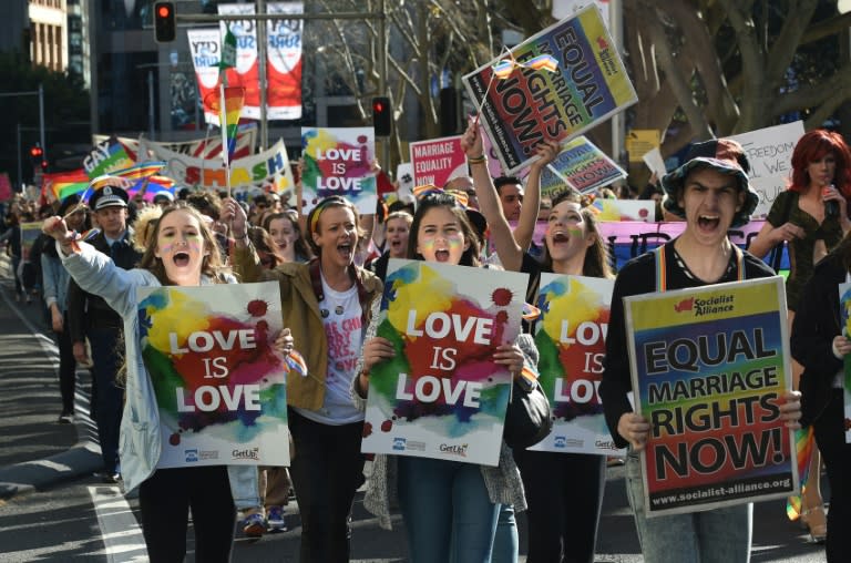 Supporters of same-sex marriage shout slogans as they take part in a rally in Sydney on August 9, 2015