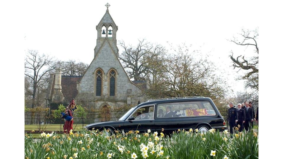 The Queen's Piper Jim Motherwell playing as the Queen Mother's Coffin is carried out of The Royal Chapel Of All Saints at Royal Lodge