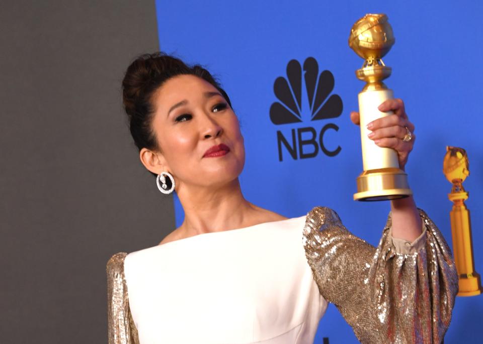 Host and Best Performance by an Actress in a Television Series Drama ‘for Killing Eve’ winner Sandra Oh poses with the trophy during the 76th annual Golden Globe Awards on January 6, 2019, at the Beverly Hilton hotel in Beverly Hills, California. (Photo by Mark RALSTON / AFP) (Photo credit should read MARK RALSTON/AFP/Getty Images)