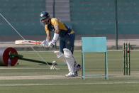 Pakistan's Mohammad Rizwan bats during a practice session for an upcoming cricket test match against South Africa at National Stadium in Karachi, Pakistan, Friday, Jan. 22, 2021. Pakistan will play the first test match on Jan. 26, against South Africa, which arrived in the southern port city of Karachi last Saturday for the first time in nearly 14 years. (AP Photo/Fareed Khan)