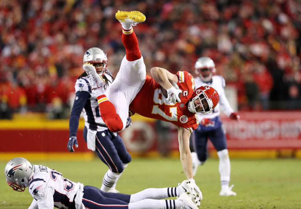 <p>Travis Kelce #87 of the Kansas City Chiefs is tackled by Jonathan Jones #31 of the New England Patriots in the first half during the AFC Championship Game at Arrowhead Stadium on January 20, 2019 in Kansas City, Missouri. (Photo by Patrick Smith/Getty Images) </p>