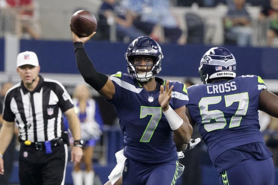 Seattle Seahawks quarterback Geno Smith (7) throws a pass in the first half of a preseason NFL football game against the Dallas Cowboys in Arlington, Texas, Friday, Aug. 26, 2022. (AP Photo/Michael Ainsworth)