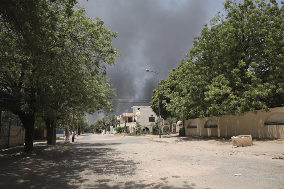 Smoke is seen rising from a neighborhood in Khartoum, Sudan, Saturday, April 15, 2023. Fierce clashes between Sudan's military and the country's powerful paramilitary erupted in the capital and elsewhere in the African nation after weeks of escalating tensions between the two forces. The fighting raised fears of a wider conflict in the chaos-stricken nation. (AP Photo/Marwan Ali)