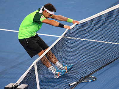 Fabio Fognini gets to grips with that pesky net.