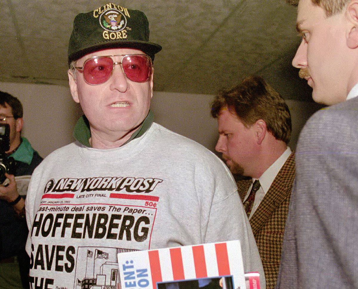 Steven Hoffenberg is detained by FBI agents in 1996.