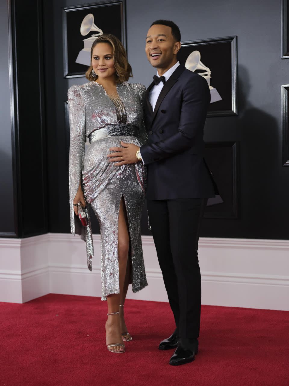 Chrissy Teigen and John Legend on the red carpet at Grammys yesterday. Source: Getty