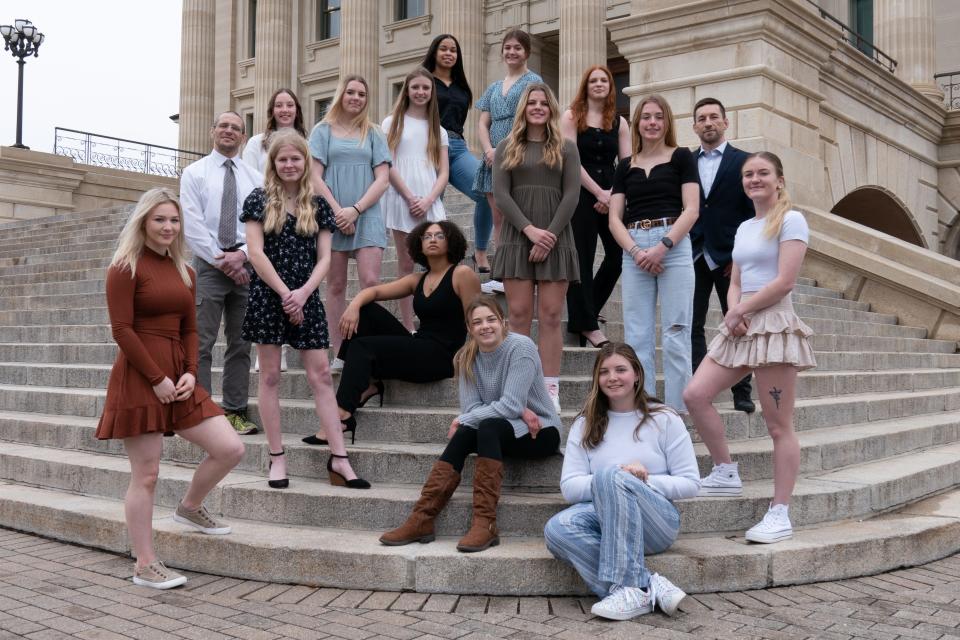 2023 All-City Girls Wrestling Team are, first row from left, Annie Gallegos, Washburn Rural; Molly Spader, Washburn Rural; and Kristin Rezac, Washburn Rural. Second row from left are Erich Singer, Shawnee Heights coach; TaAni Rhote, Washburn Rural; Ashley Schwarz, Washburn Rural; Maddy Blow, Washburn Rural; and Addi Broxterman, Washburn Rural. Third row from left are Taylie Heston, Seaman; Kaidence Heston, Seaman; Madison Davison, Washburn Rural; Kodi Best, Seaman; and Chad Parks, Shawnee Heights coach. Top row from left are Tristyn Johnson, Topeka West; and Madison Freeland, Shawnee Heights.