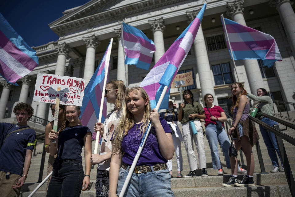 FILE - Misy Sifre, 17, and others protest for transgender rights at the Capitol in Salt Lake City, March 25, 2022. On Tuesday, July 2, 2024, a federal judge in Kansas blocked a federal rule expanding anti-discrimination protections for LGBTQ+ students from being enforced in four states, including Utah and a patchwork of places elsewhere across the nation. (Spenser Heaps/The Deseret News via AP, File)