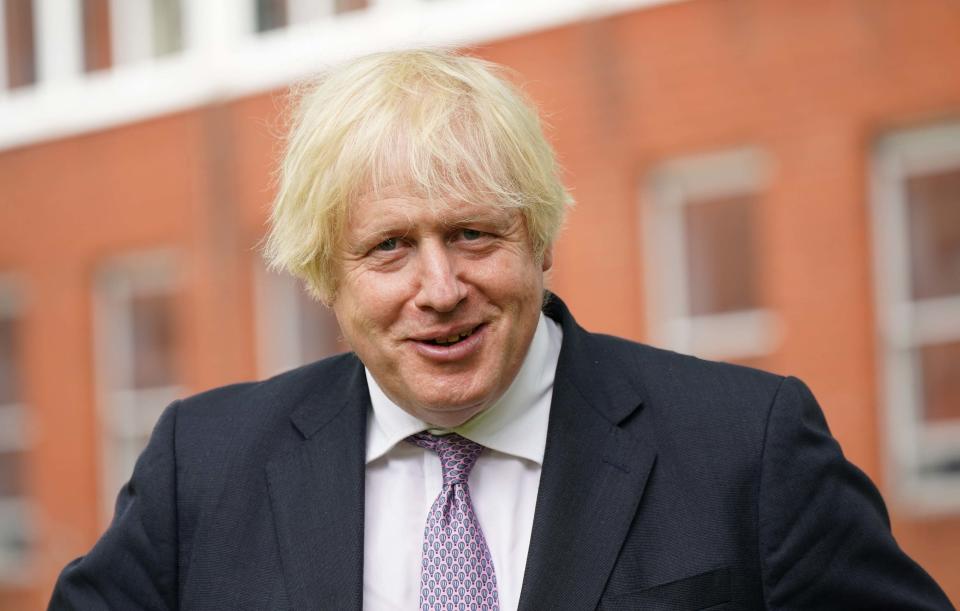 Britain's Prime Minister Boris Johnson visits Surrey Police headquarters in Guildford, south west of London, on July 27, 2021 to coincide with the publication of the government's plans to tackle crime. (Photo by Yui Mok / POOL / AFP) (Photo by YUI MOK/POOL/AFP via Getty Images)