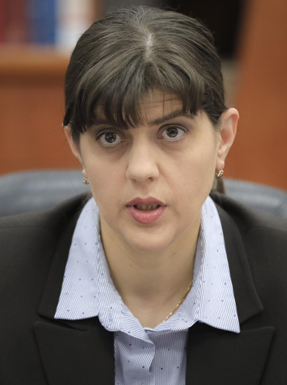 Chief anti-corruption prosecutor Laura Codruta Kovesi speaks during an interview with The Associated Press in Bucharest, Romania, Tuesday, Jan. 31, 2017. Thousands of Romanians hit the street late Tuesday to protest a government decision that decriminalizes some official misconduct, dealing a blow to a years long drive to curb corruption in the eastern European country. Romania's government adopted an emergency ordinance late Tuesday to decriminalize official misconduct, dealing a blow to a yearslong drive to curb corruption in the eastern European country. (AP Photo/Vadim Ghirda)