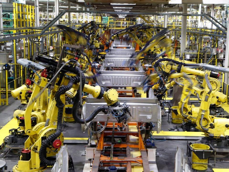  Robots weld the beds of Ford F-150 trucks at an assembly plant in Detroit, in 2018.