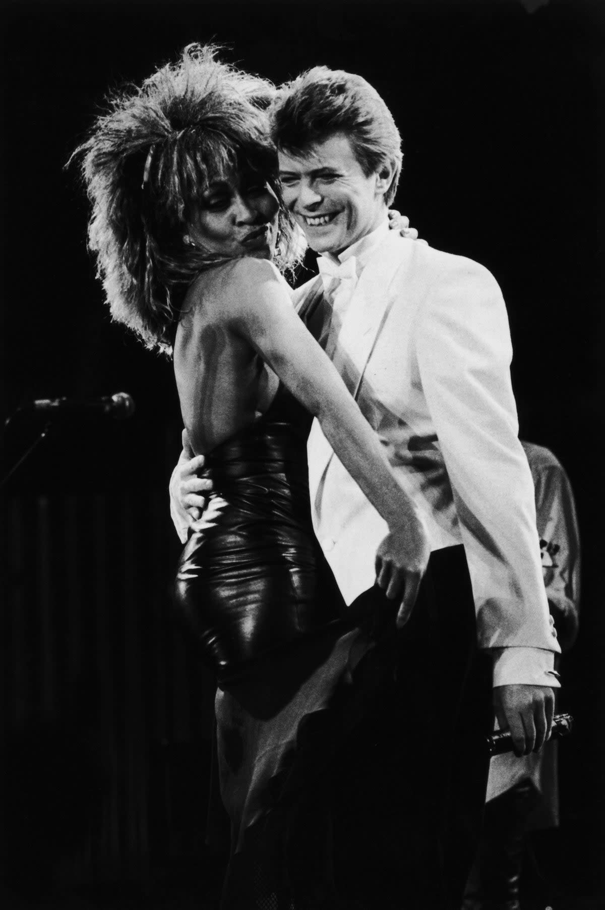On stage with David Bowie in 1985 (Getty)