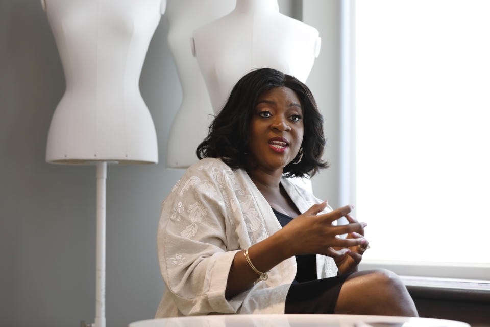In this June 4, 2019, photo Ezinne Kwubiri, H&M's Head of Diversity and Inclusion, North America, is interviewed in their New York headquarters. Kwubiri recently spoke with The Associated Press about her new role at H&M and the challenges for the fashion giant, which has more than 4,000 stores globally. (AP Photo/Richard Drew)