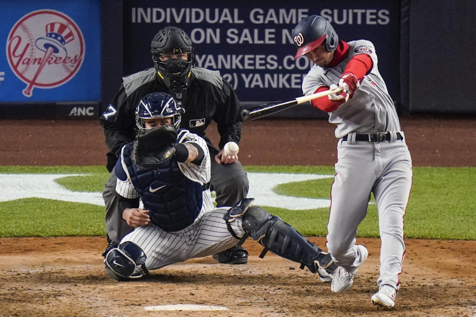 Washington Nationals' Trea Turner hits an RBI single during the eighth inning of the team's baseball game against the New York Yankees on Friday, May 7, 2021, in New York. (AP Photo/Frank Franklin II)