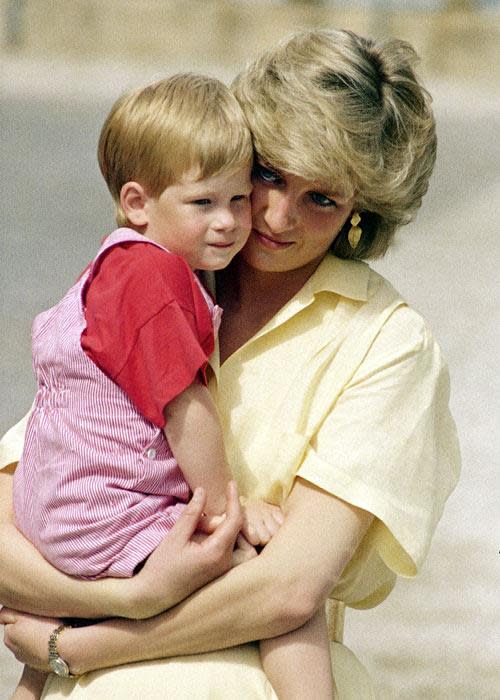 Princess Diana, who's carrying Prince Harry in this photo, once said, "Don't call me an icon. I'm just a mother trying to help. I'd like to be a queen in people's hearts but I don't see myself being queen of this country."