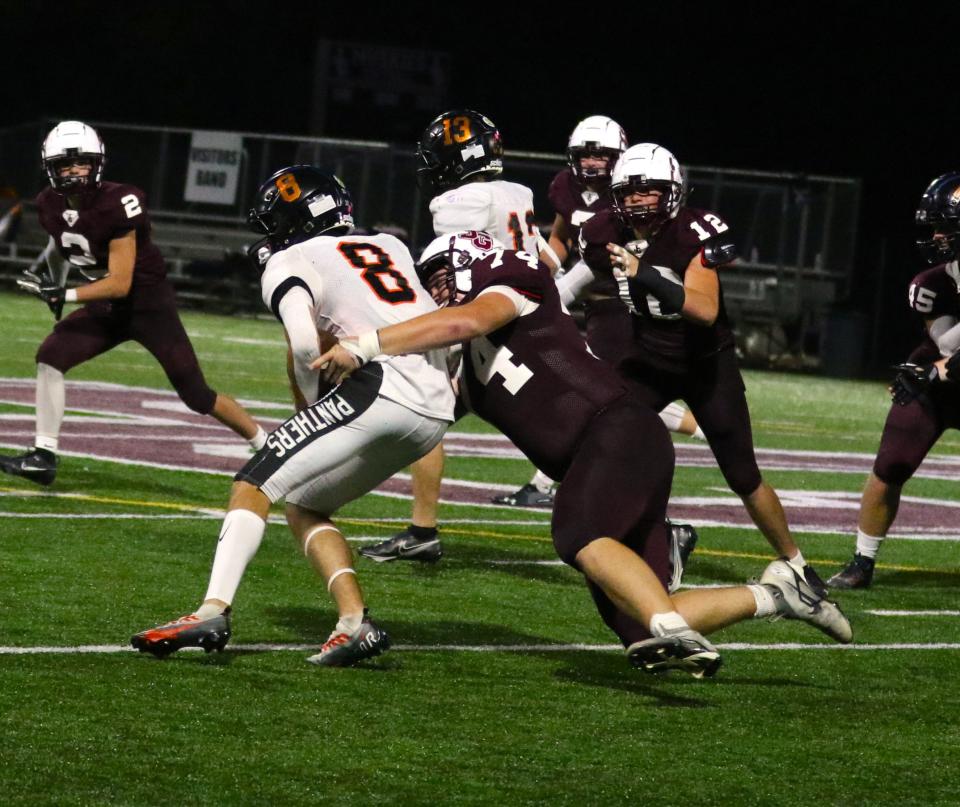 John Glenn's Nic Xanders brings down New Lexington's Isaiah Stephens during a regular season win. Xanders made first team All-Ohio and led several Muskies on that squad.