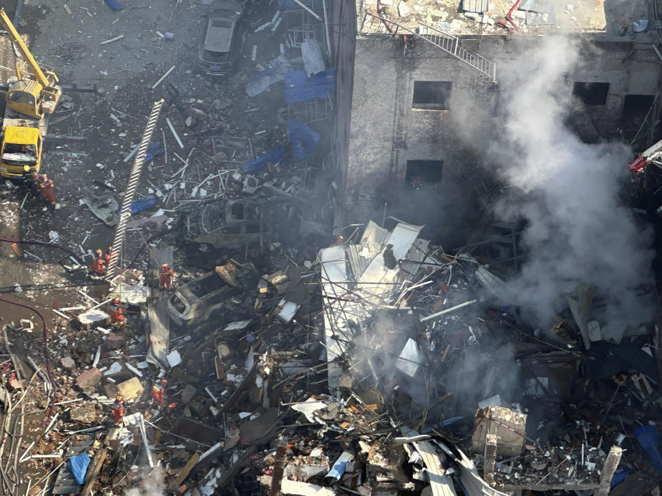 Firefighters work the scene of an explosion in Sanhe city in northern China’s Hebei province on Wednesday, March 13, 2024. Rescuers were responding to a suspected gas leak explosion Wednesday in a building in northern China, authorities said. (AP Photo/Ng Han Guan)