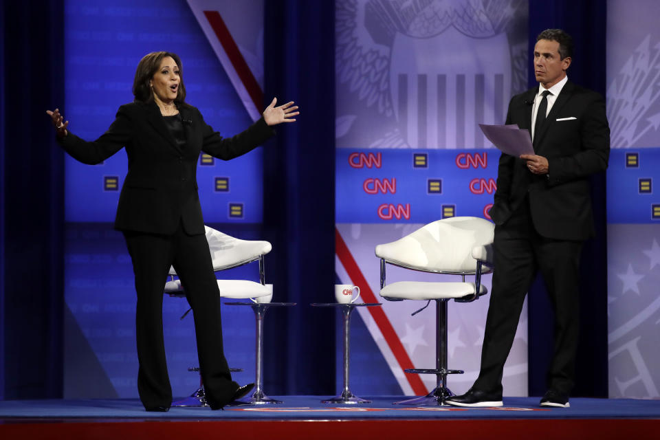 Democratic presidential candidate Sen. Kamala Harris, D-Calif., answers a question as CNN moderator Chris Cuomo listens during the Power of our Pride Town Hall Thursday, Oct. 10, 2019, in Los Angeles. The LGBTQ-focused town hall featured nine 2020 Democratic presidential candidates. (AP Photo/Marcio Jose Sanchez)