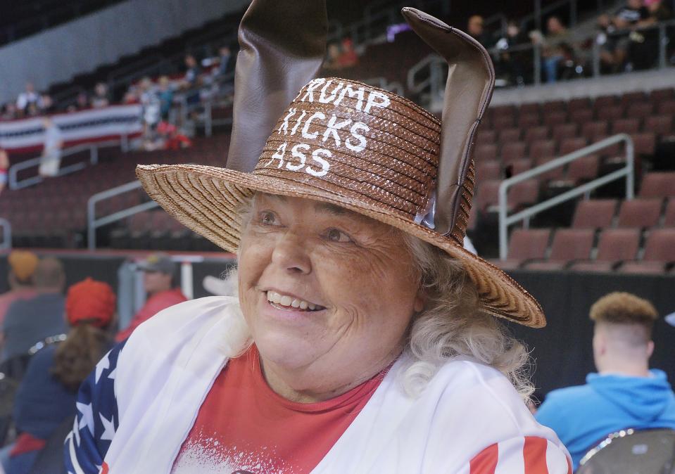 Donald Trump supporter Sharon Anderson, 67, from Etowah, Tenn., is interviewd inside Erie Insurance Arena prior to the Trump rally in Erie on July 29, 2023. She said she made her hat and that she could sell all others if she were inclined to make more.