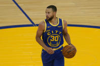 Golden State Warriors guard Stephen Curry (30) dribbles against the Utah Jazz during the second half of an NBA basketball game in San Francisco, Monday, May 10, 2021. (AP Photo/Jeff Chiu)