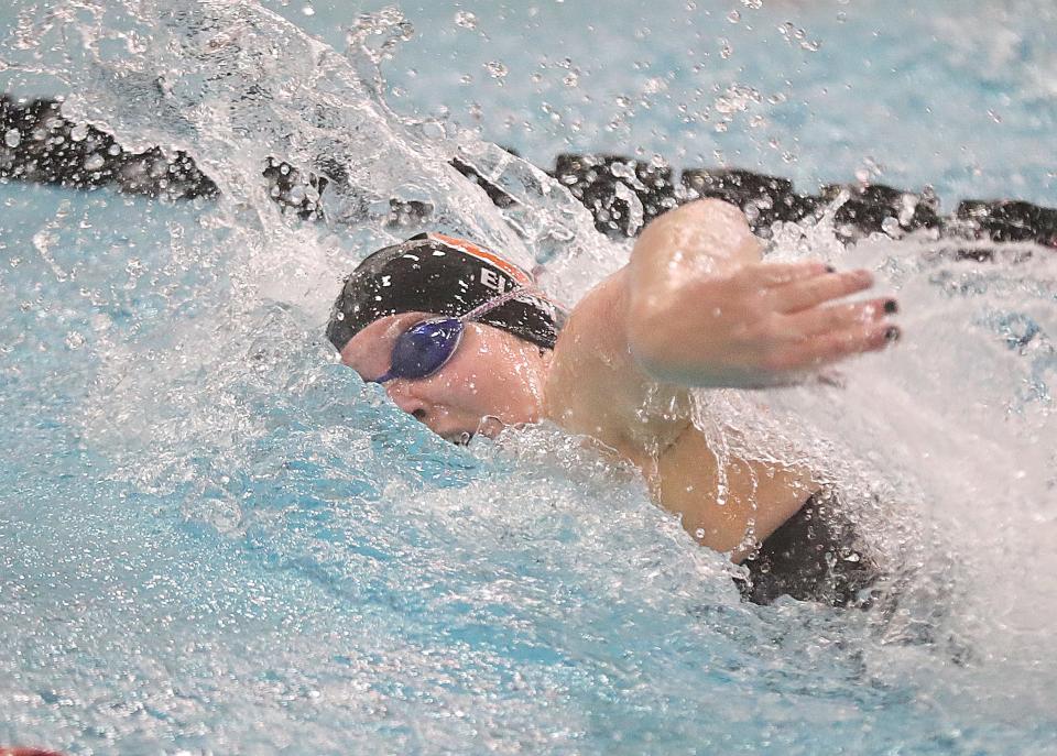 Green's Olivia Elgin on her way to a third-place finish in the  100-yard freestyle during the Division I state meet Saturday, Feb. 25, 2023 in Canton.