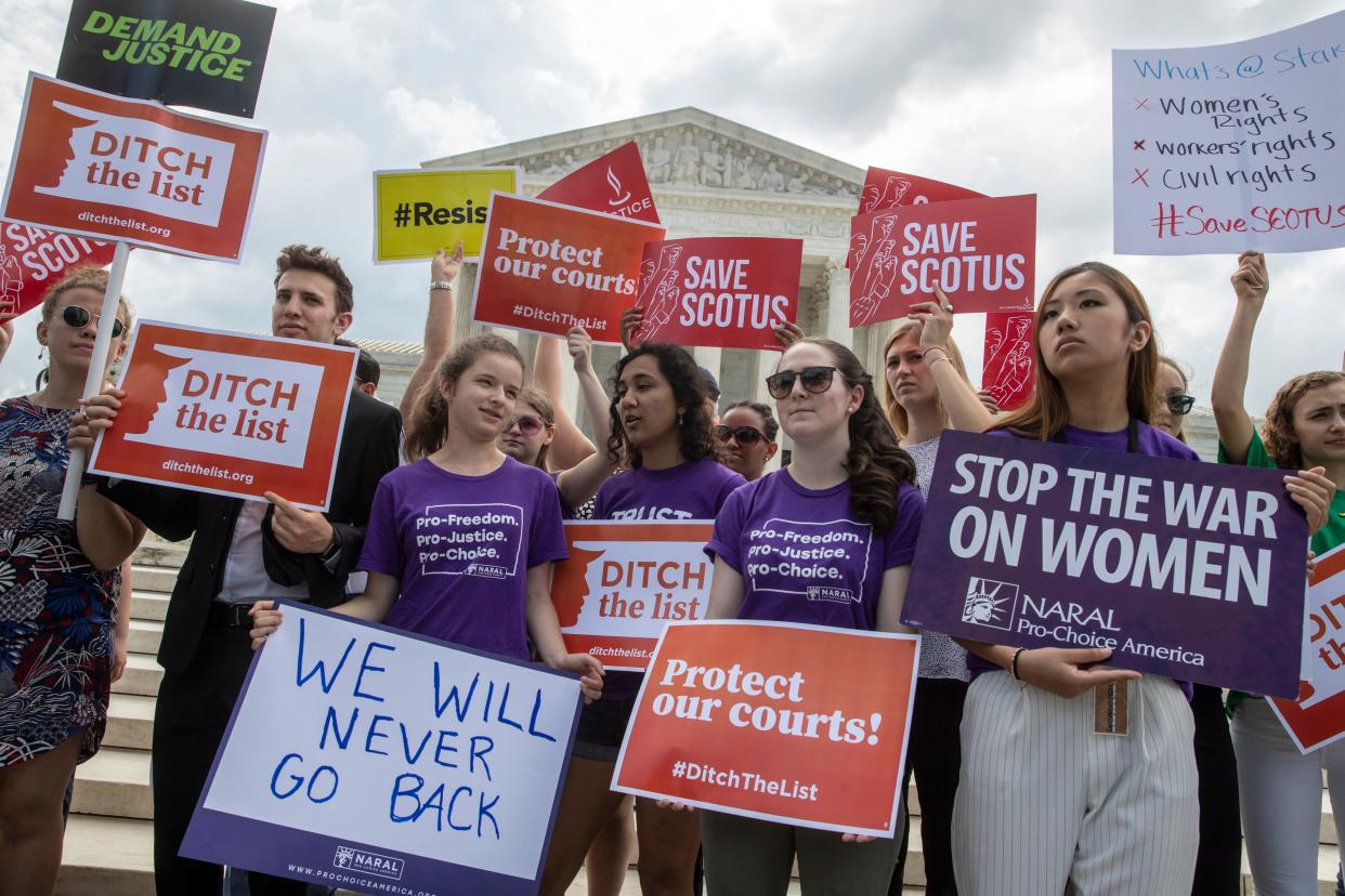 Protestors outside the Supreme Court on June 28, 2018.