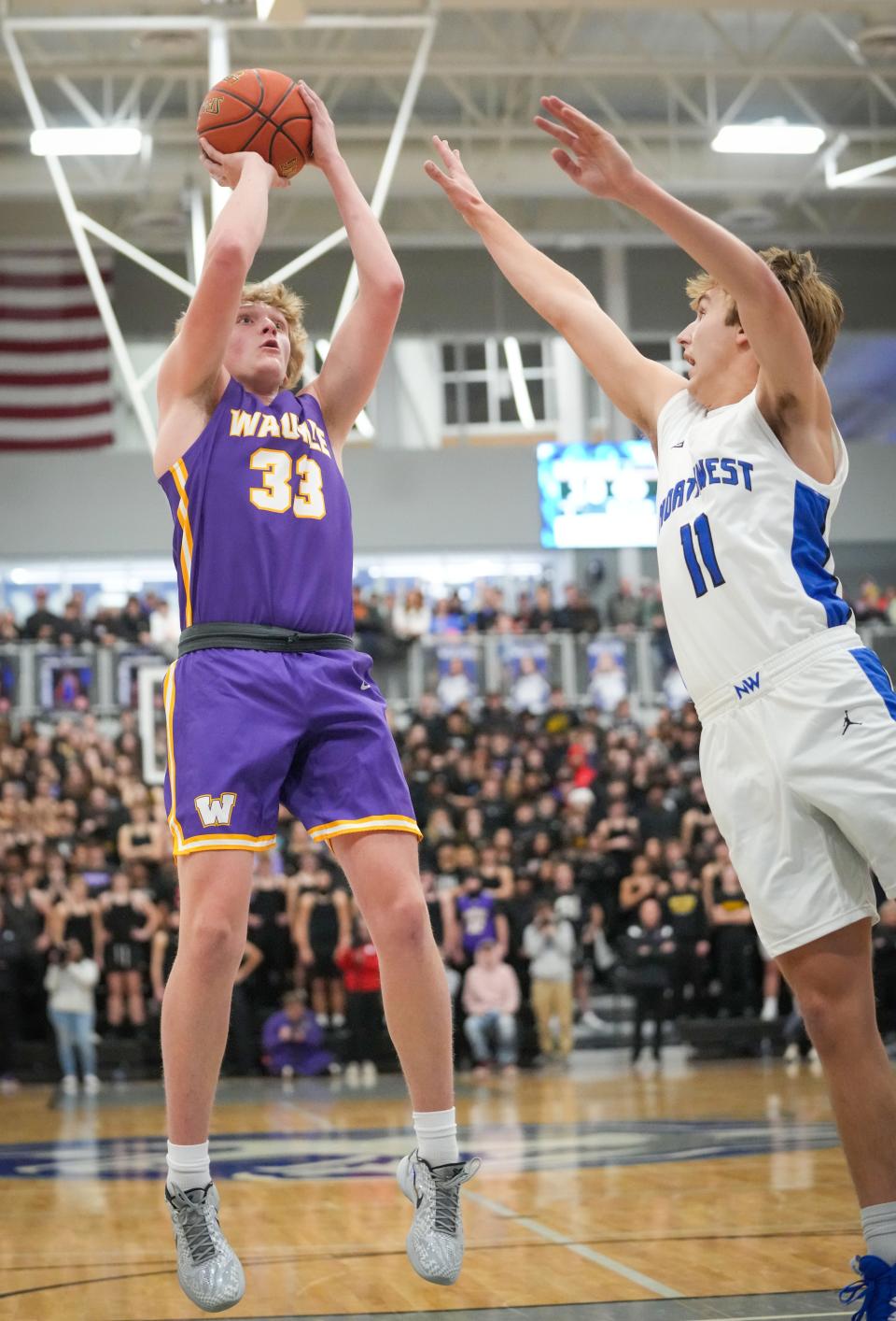 Cade Littlefield of Waukee puts up a shot during a game against Waukee Northwest, Tuesday, Dec. 6, 2022.