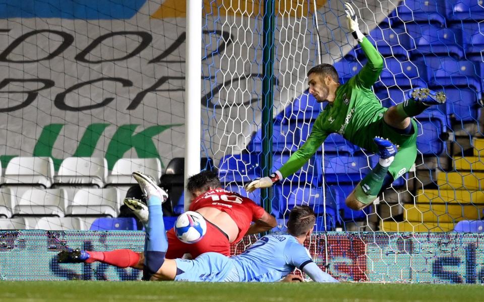 Lukas Jutkiewicz of Birmingham City crashes into the goal post after missing a scoring oppertunity during the Sky Bet Championship match between Coventry City and Birmingham City - Michael Regan/Getty Images