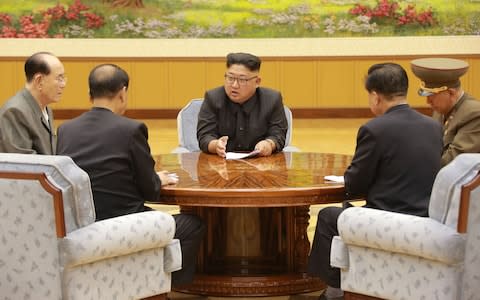 North Korean leader Kim Jong Un participates in a meeting with the Presidium of the Political Bureau of the Central Committee of the WorkersÃ• Party of Korea - Credit: REUTERS/KCNA