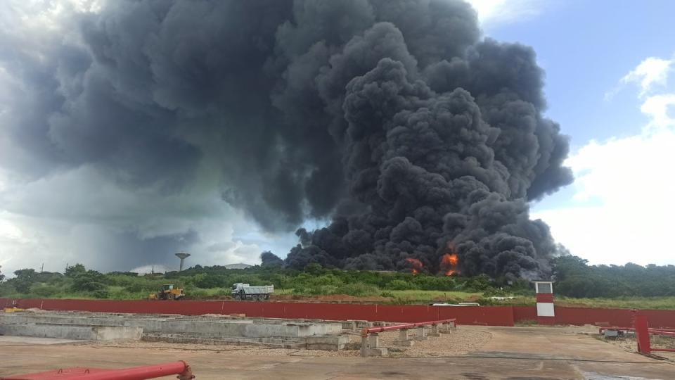 Dozens have been injured and 17 people are missing after lightning struck two fuel storage tanks in Cuba (EPA)