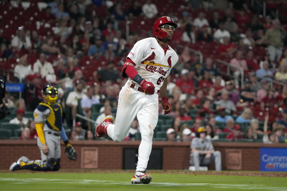 St. Louis Cardinals' Richie Palacios watches his solo home run during the fifth inning of a baseball game against the Milwaukee Brewers Tuesday, Sept. 19, 2023, in St. Louis. (AP Photo/Jeff Roberson)