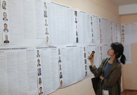 A voter visits a polling station during Ukraine's parliamentary election in Kiev