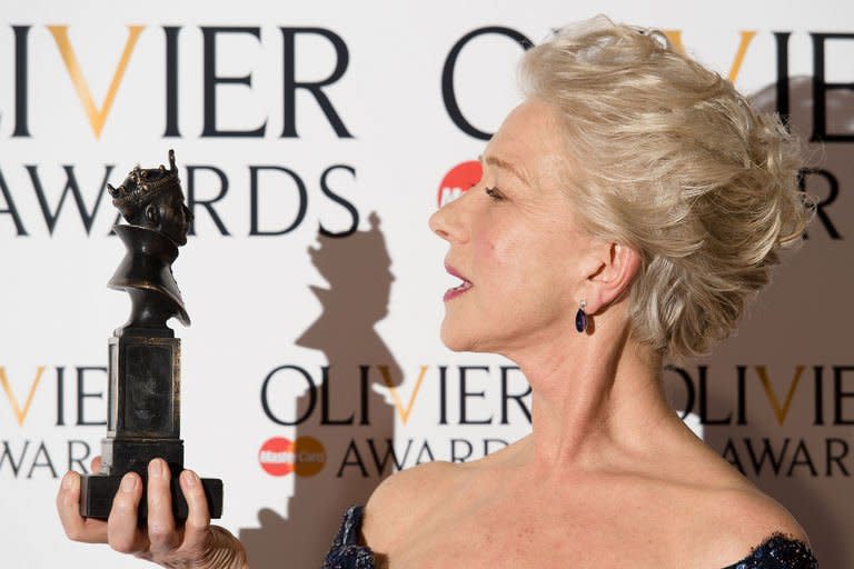 Helen Mirren poses with her award for best actress during the Lawrence Olivier Awards for theatre at the Royal Opera House in London on April 28, 2013