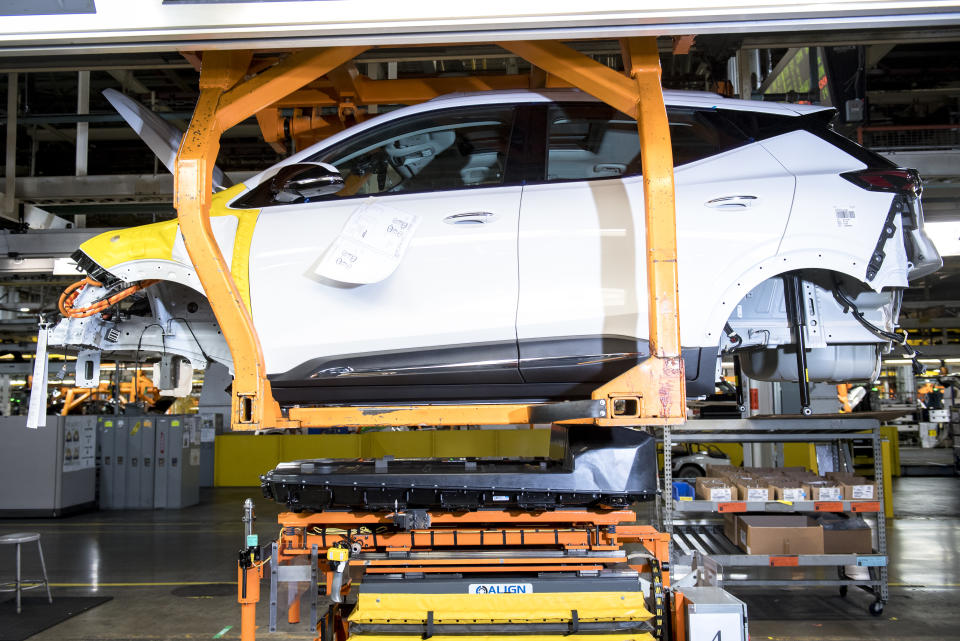 LAKE ORION, MI - JULY 21: A battery moves beneath a a Chevrolet Bolt EUV in production during the battery install line of production at Orion Assembly in Lake Orion, Michigan on July 21, 2021. (Photo by Nic Antaya for The Washington Post via Getty Images)