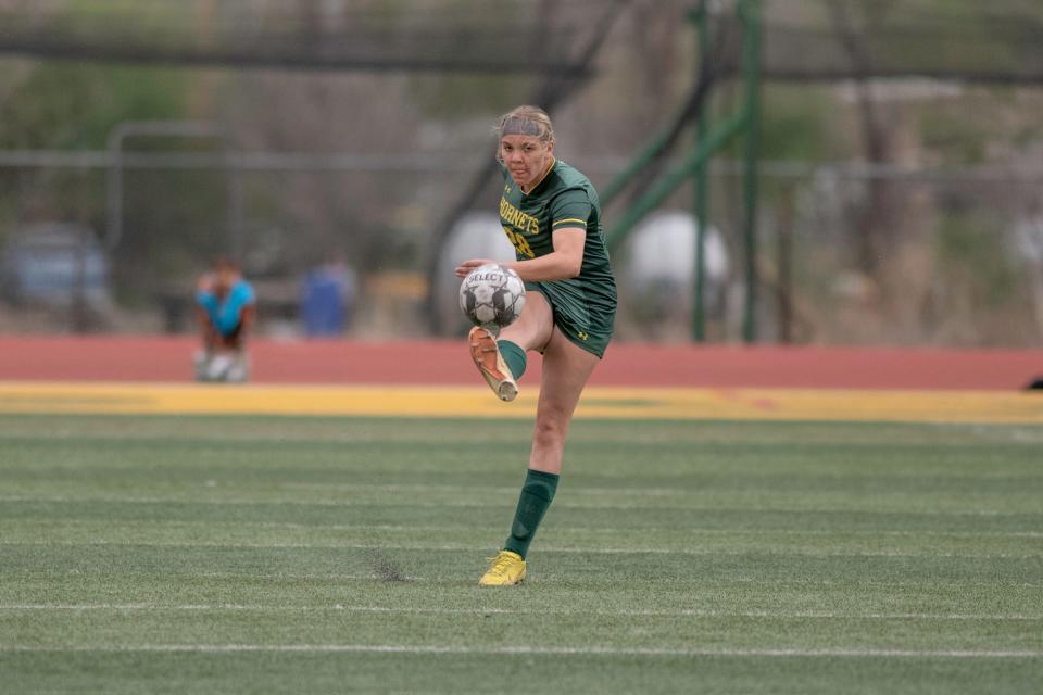 Pueblo County's Rylee Stupnik clears the ball during a playoff matchup against Montrose on Wednesday, May 10, 2023.