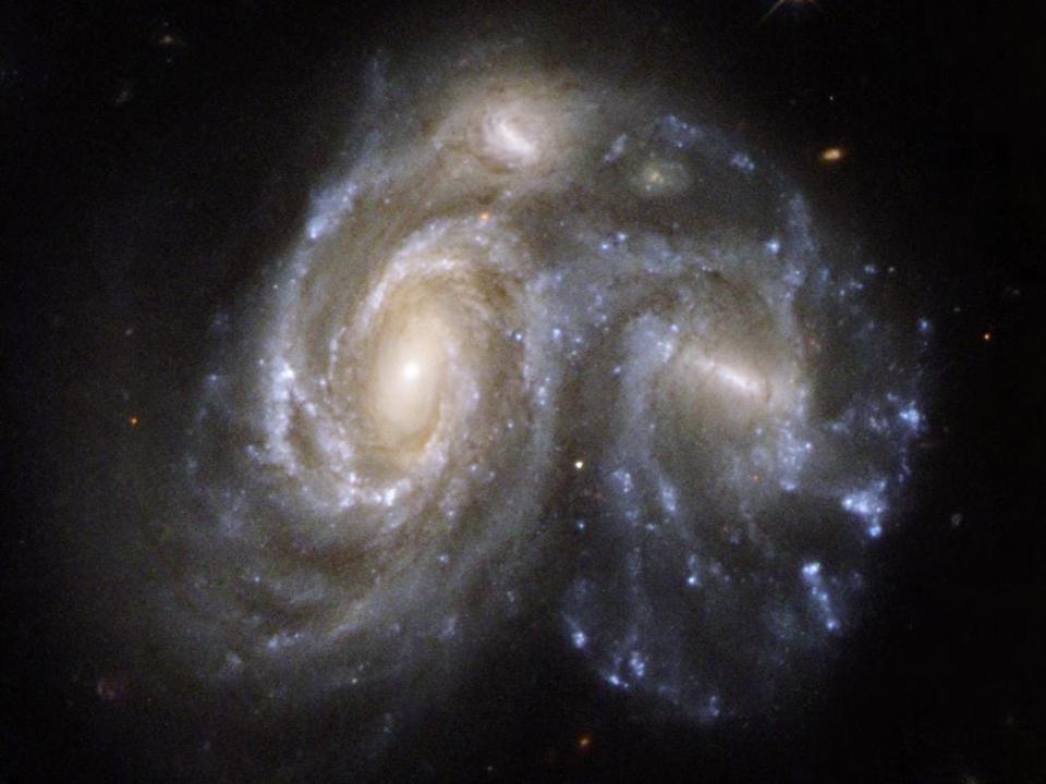 galaxies collide collision hubble spiral galaxy