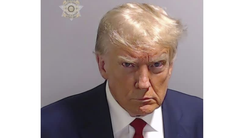 This booking photo provided by Fulton County Sheriff’s Office shows former President Donald Trump on Thursday, Aug. 24, 2023, after he surrendered and was booked at the Fulton County Jail in Atlanta. Trump is accused by District Attorney Fani Willis of scheming to subvert the will of Georgia voters in a bid to keep Joe Biden out of the White House.