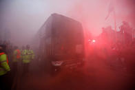 <p>Soccer Football – Champions League Quarter Final First Leg – Liverpool vs Manchester City – Anfield, Liverpool, Britain – April 4, 2018 Liverpool fans set off flares as the Manchester City team bus arrives outside the stadium before the match Action Images via Reuters/Carl Recine </p>