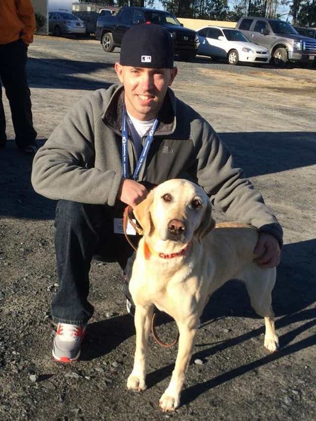 Brockton firefighter Matthew Flaherty was reunited with his dog Chica, whom he served with as a U.S. Marine in Afghanistan, in 2014. Flaherty was killed in a single-vehicle motorcycle crash in West Bridgewater on April 11, 2022.