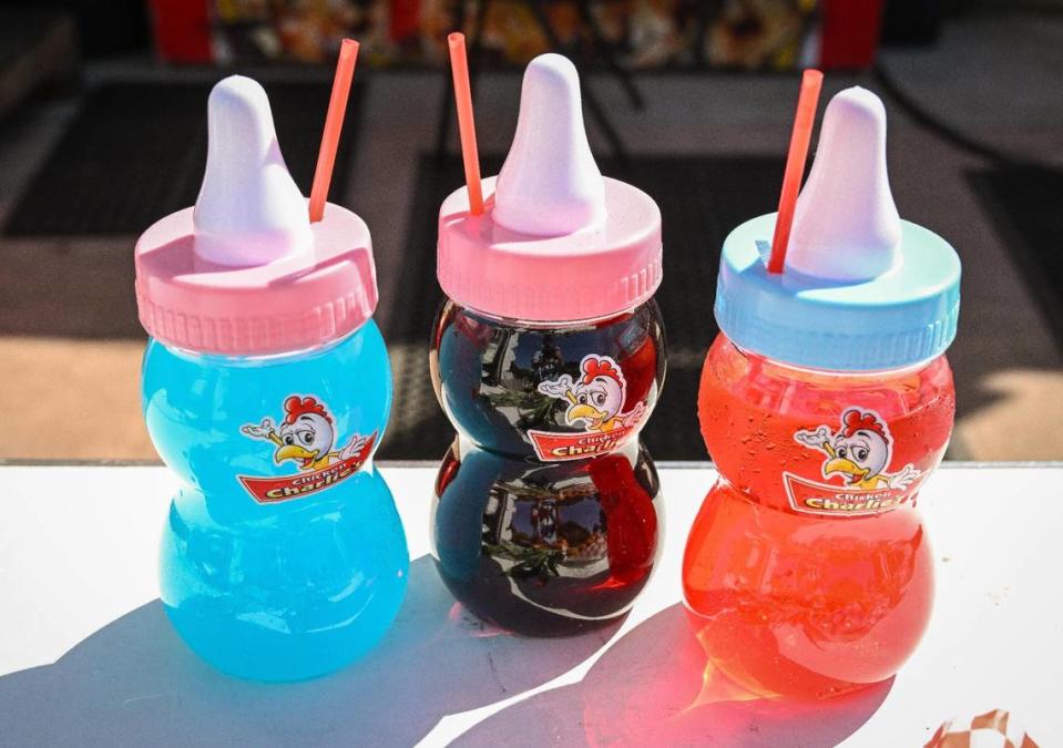 Fruity house-made Kool-Aid drinks served in giant baby bottles are available at Chicken Charlies at this year’s Big Fresno Fair.