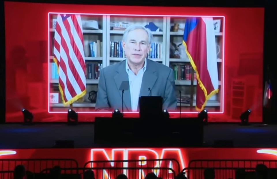 Abbott speaking in a pre-recorded video at the NRA convention (Fox)